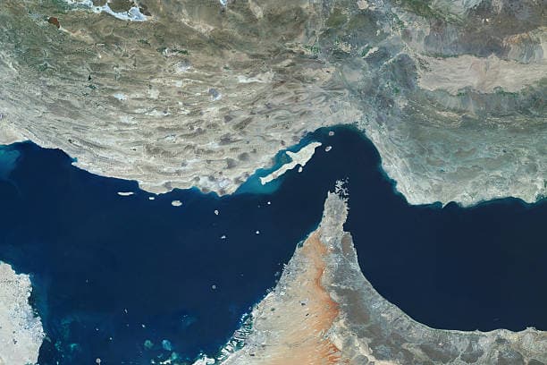 Satellite view of the Strait of Hormuz in the Persian Gulf, showing Iran’s Abu Musa, Greater Tunb, Lesser Tunb, Qeshm, Sirri, Hormuz, and Kharg Islands, vital to energy trade and defense.