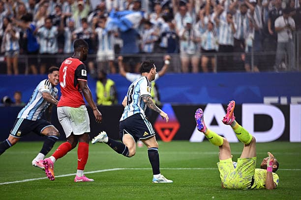 Argentina's forward #10 Lionel Messi (C) celebrates after scoring the opening goal during the 2026 World Cup Group J football match between Argentina and Austria at the Dallas Stadium in Arlington on June 22, 2026.